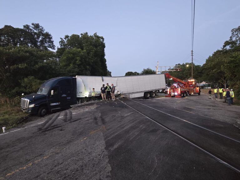 Tractor-trailer hit by train blocks Georgia railroad crossing for hours 