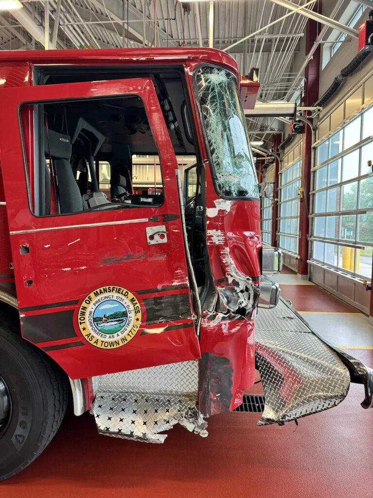 Authorities seek driver of semi that struck Massachusetts fire truck