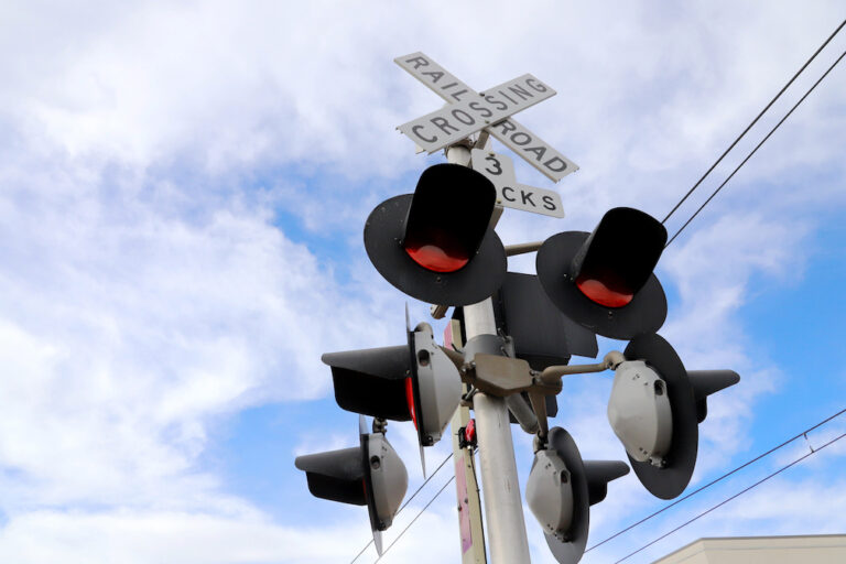 West Georgia police looking for rig that knocked out railroad crossing.