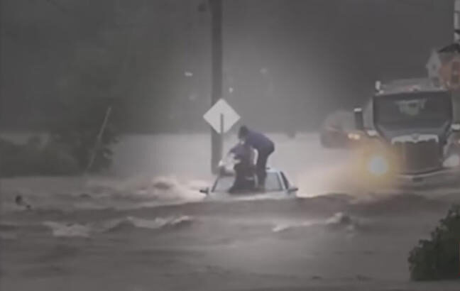 Mystery truck driver saves mom and two children in flash flood