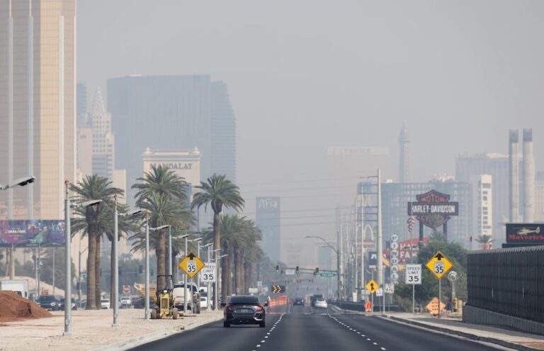 Wildfires scorch Southern California hillside homes. More are threatened