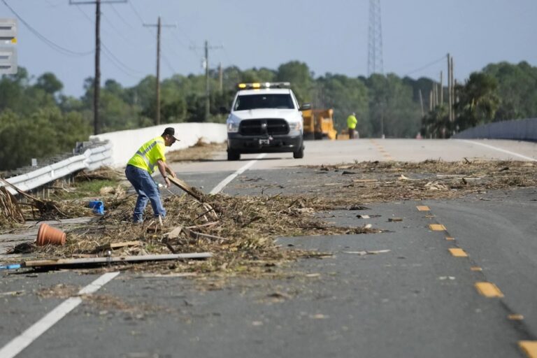 Georgia interstates shut down, rescuers race to free people trapped by Hurricane Helene after storm kills at least 21 in 4 states