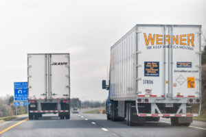 Blue rest area exit sign on highway 15 in Pennsylvania with Werner transportation truck