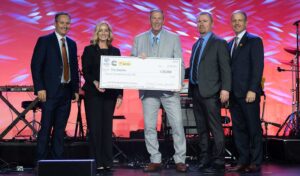 Tim Chelette Accepts Driver of Year Check web