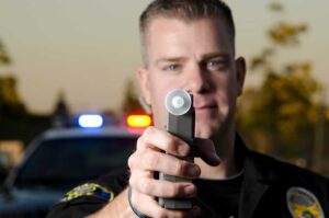 Trooper with Breathalyzer iStock web