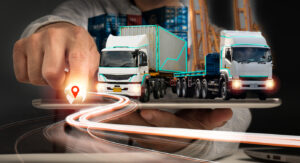 A businessman uses a tablet for logistic network distribution and smart transportation, as well as for networking intelligent logistics of container cargo ships, logistic import export,and industrial.