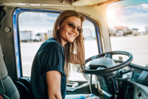 Professional female truck driver working