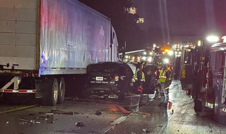 Trucker facing charges after hitting police vehicles near the Atlanta airport