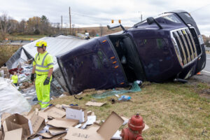 overturned and damage truck. road accident, crash.