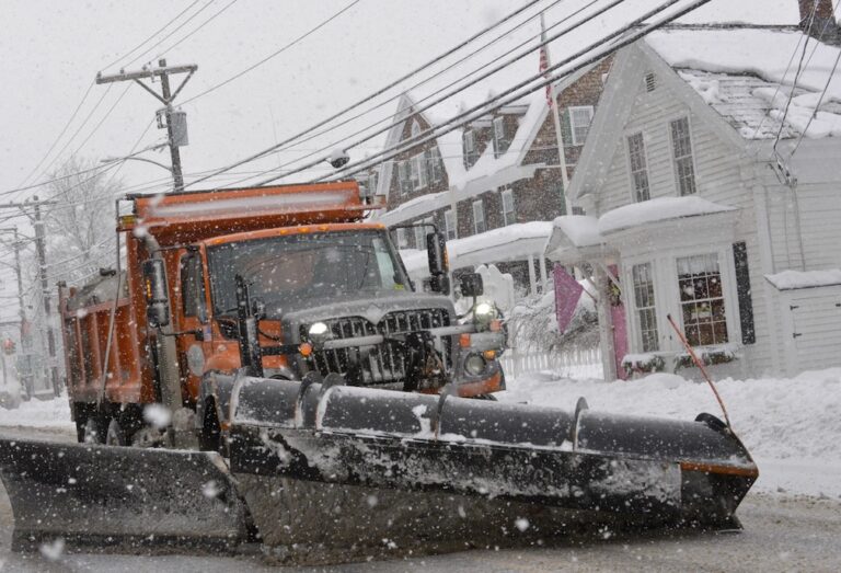 A storm brings squalls to the Northeast; 2 people die from heart attacks after shoveling snow