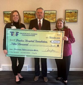 Trucking Cares Presents Check to PHF