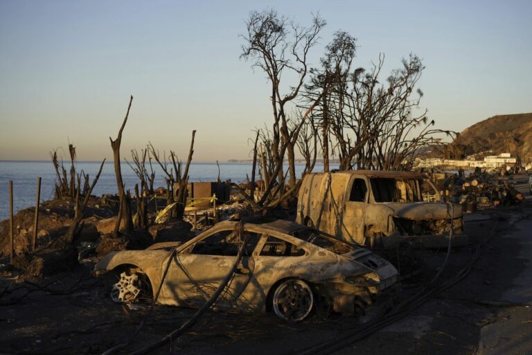 New wildfire warnings issued and more power is shut off as winds rise in Southern California