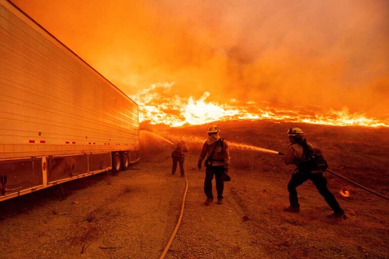 Aerial attack helps firefighters maintain the upper hand on Hughes Fire north of Los Angeles