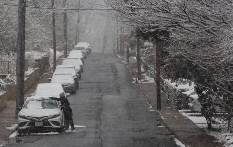 Snow and freezing rain pummel the mid-Atlantic while California prepares for likely flooding