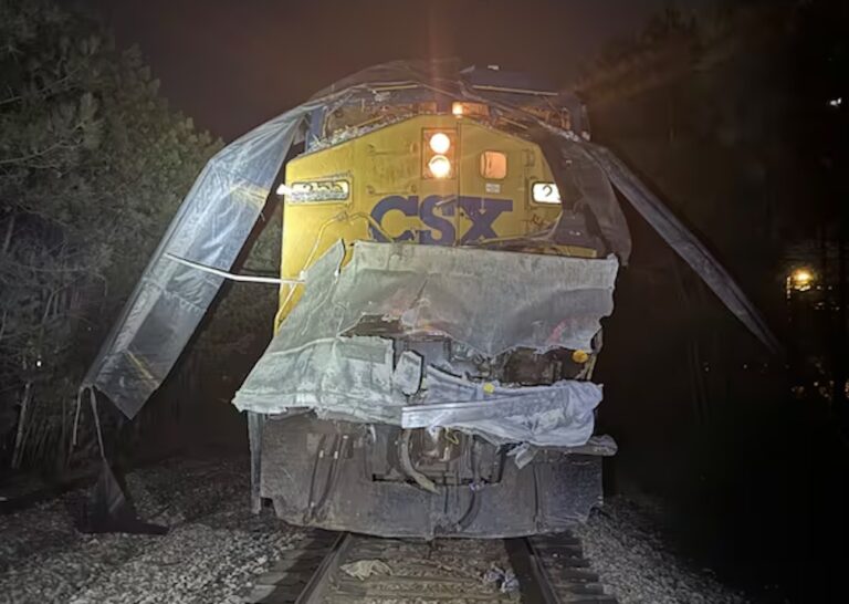 Train collides with tractor-trailer blocking roads near Atlanta