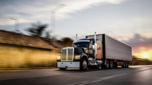 American style truck on freeway pulling load. Transportation theme. 3D illustration