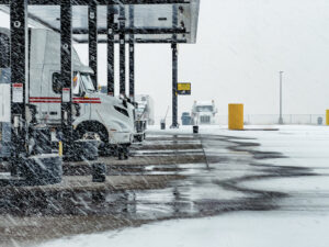 Snowy Conditions at a Truck Stop