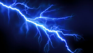 Blue lightning on dark background