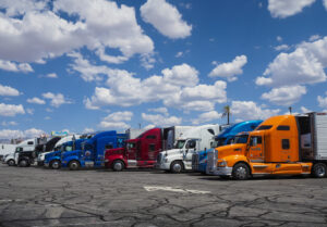 Row of American trucks parked at truck stop